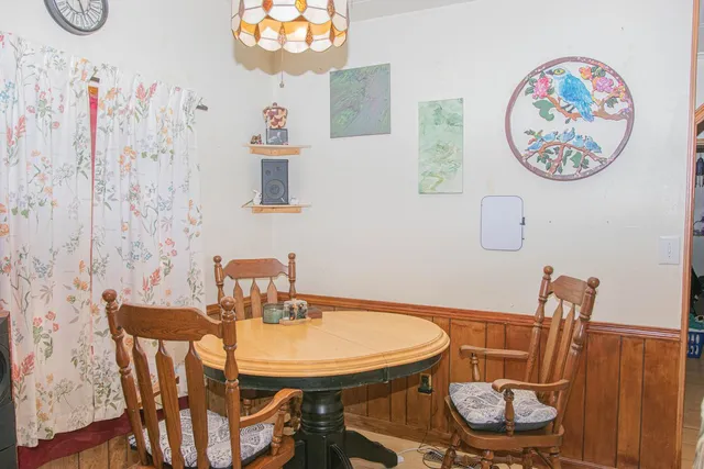 a view of a workspace with furniture