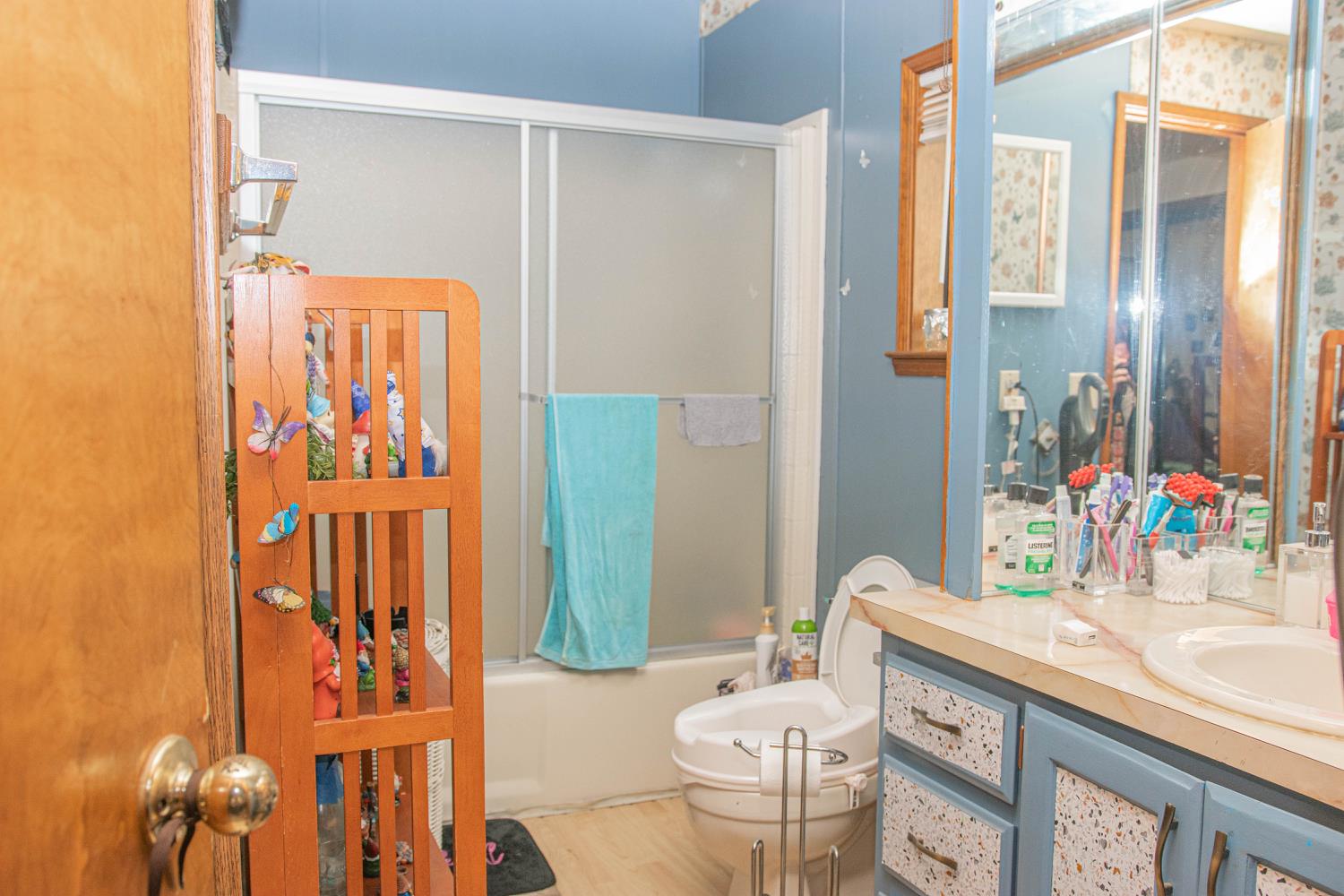 5010 Hope Mountain Road Georgetown, CA 95634 - Photo 35 of 42 a bathroom with a sink a toilet and shower
