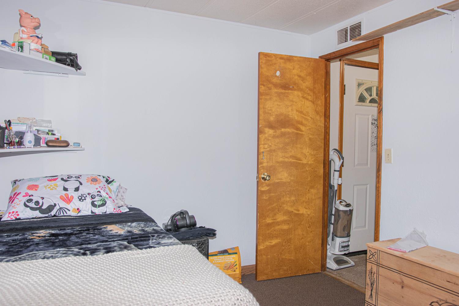 5010 Hope Mountain Road Georgetown, CA 95634 - Photo 37 of 42 a bedroom with a bed and wooden floor