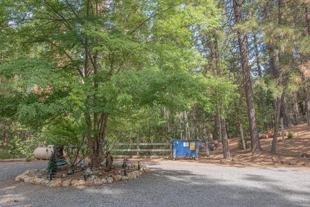 a bathroom with a sink toilet and a mirror