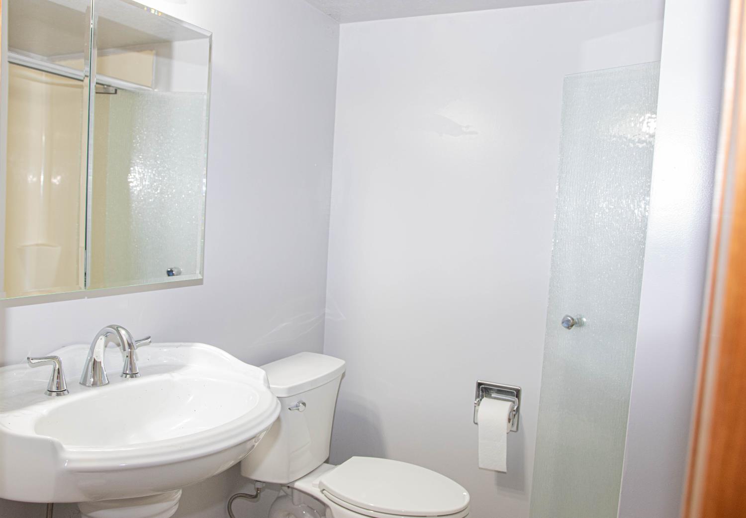 5010 Hope Mountain Road Georgetown, CA 95634 - Photo 42 of 42 a bathroom with a sink toilet and a mirror