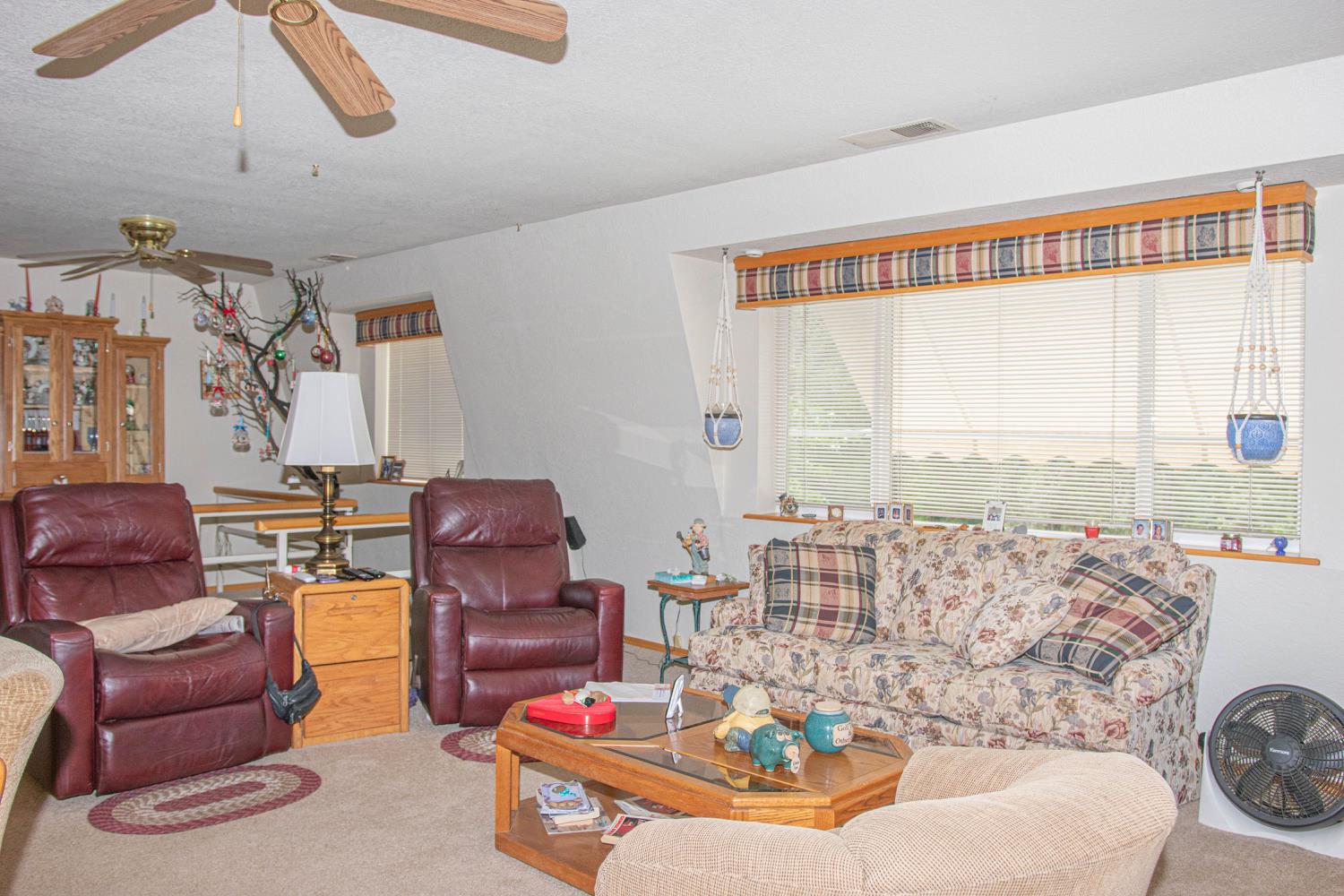 5010 Hope Mountain Road Georgetown, CA 95634 - Photo 9 of 42 a living room with furniture and a large window