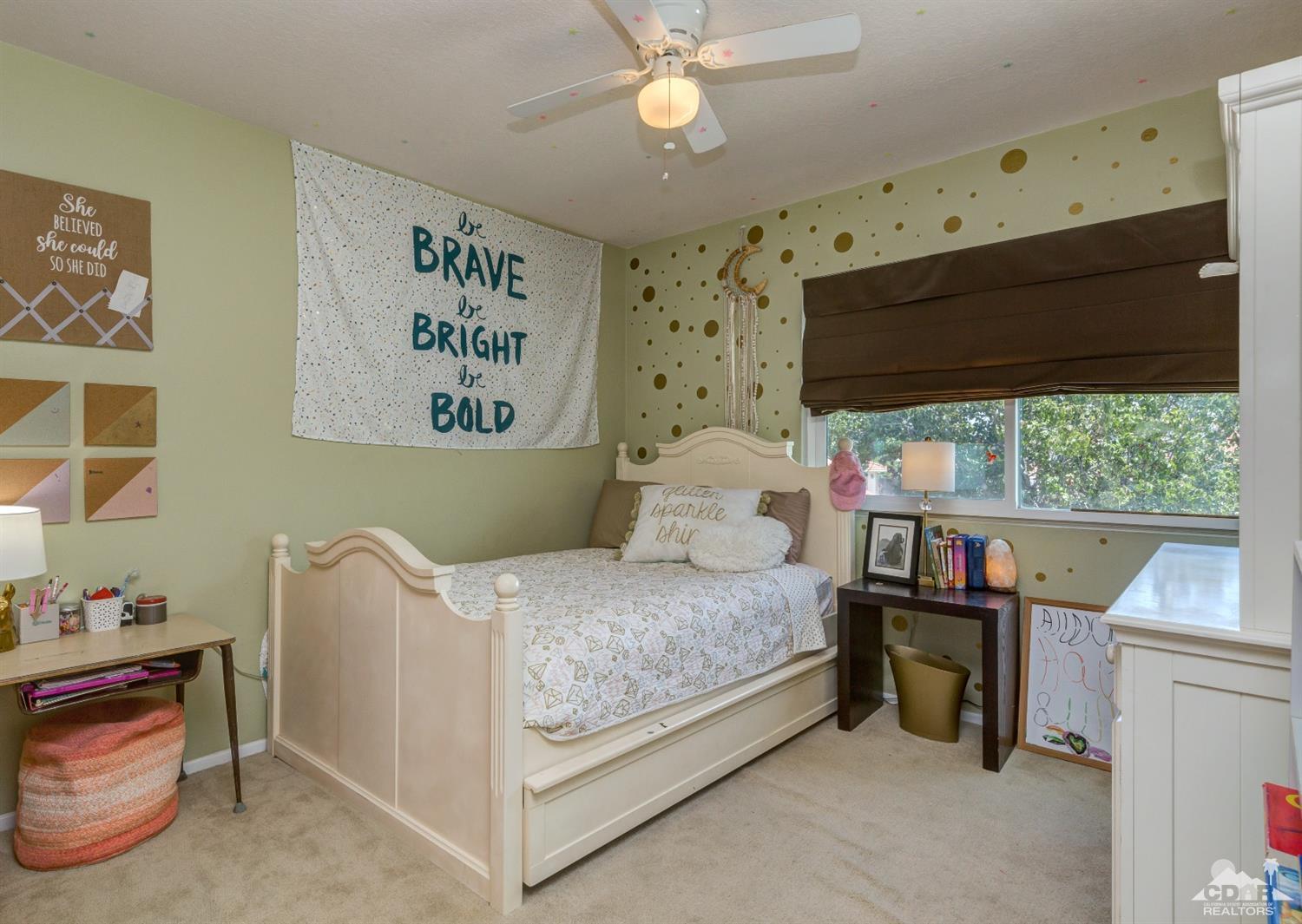9043 Dancy Circle Riverside, CA 92508 - Photo 22 of 35 a bedroom with a bed and a window