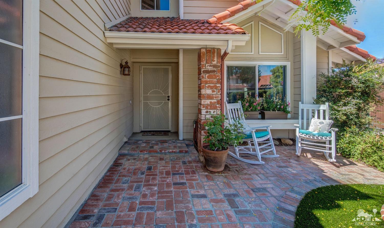9043 Dancy Circle Riverside, CA 92508 - Photo 8 of 35 a view of a house with chairs and plants