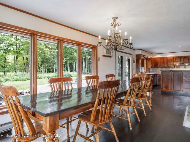 a kitchen with stainless steel appliances granite countertop a refrigerator and a stove