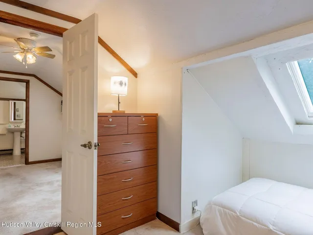 a bathroom with a sink a mirror and a toilet