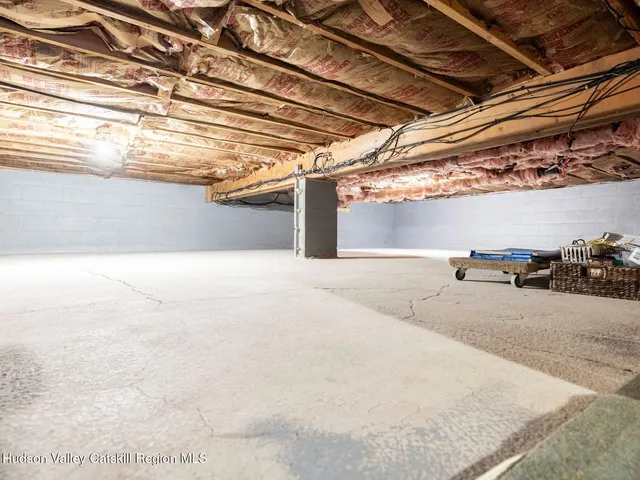 a view of a grassy field with trees