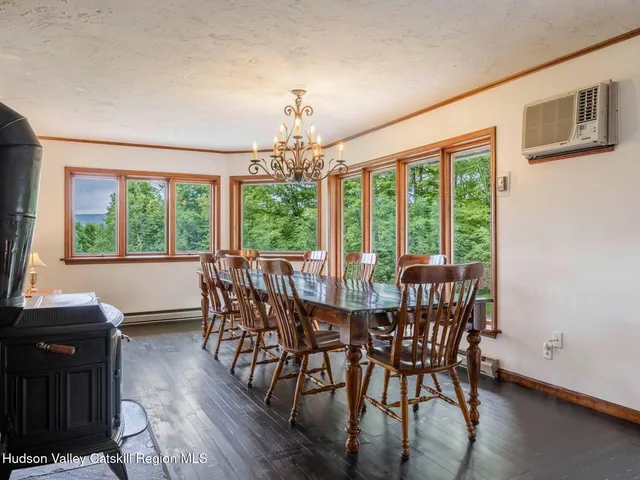 a kitchen with stainless steel appliances wooden cabinets a sink and a stove