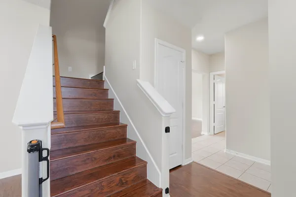 a view of entryway with wooden floor