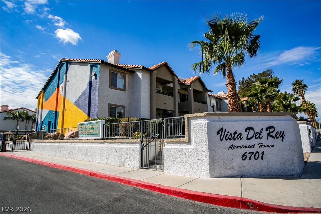 6750 Del Rey Avenue, Unit 108 Las Vegas, NV 89146 - Photo 11 of 11 This vibrant complex features appealing architecture, creating an inviting atmosphere.