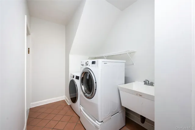 a utility room with dryer and washer