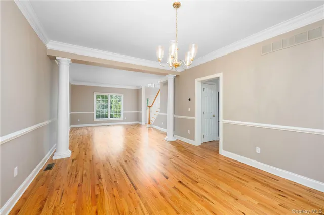 a view of livingroom with hardwood floor and window
