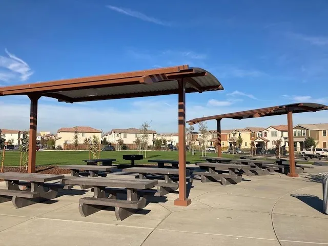 a view of swimming pool with outdoor seating