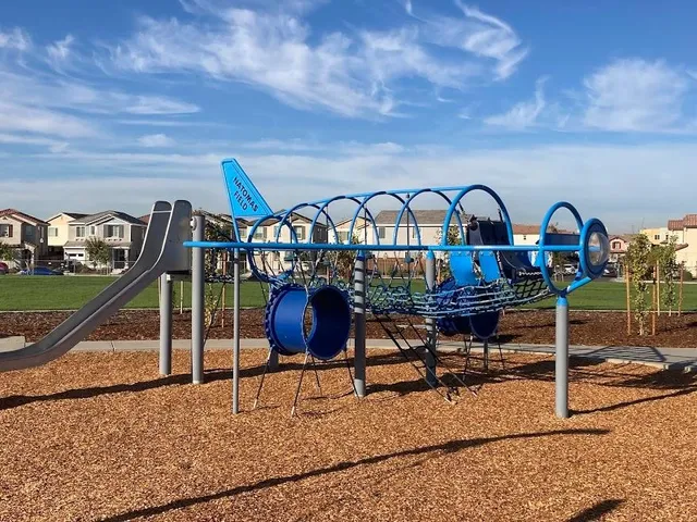 a terrace with outdoor seating and city view