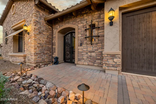a view of a chairs and table in a patio
