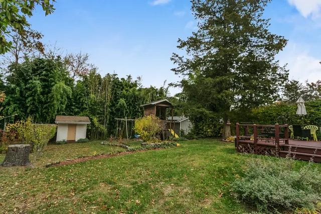a view of balcony with deck and wooden floor