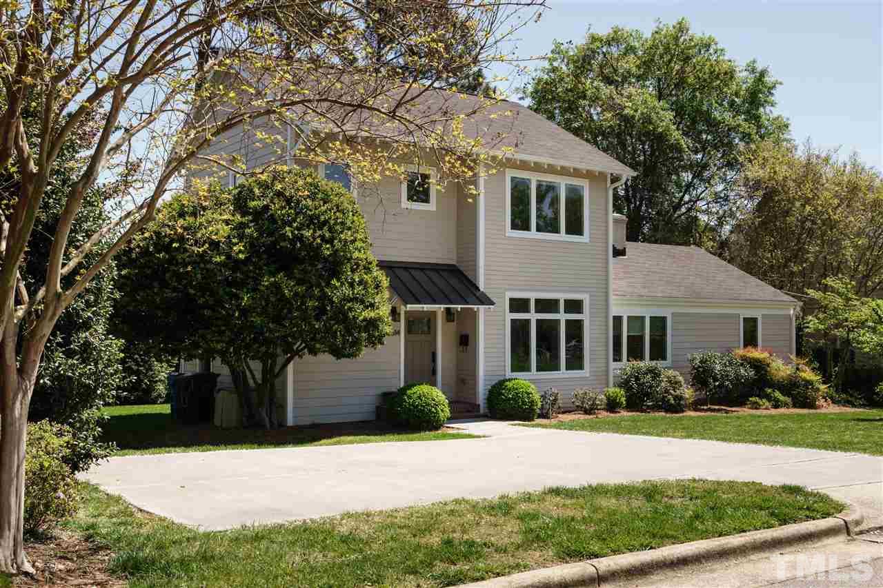 2514 Colton Place Raleigh, NC 27609 - Photo 1 of 25 a front view of a house with garden