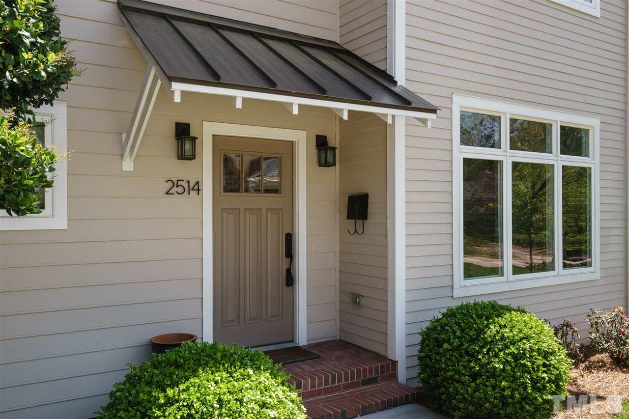 2514 Colton Place Raleigh, NC 27609 - Photo 2 of 25 a front view of a house with a plants