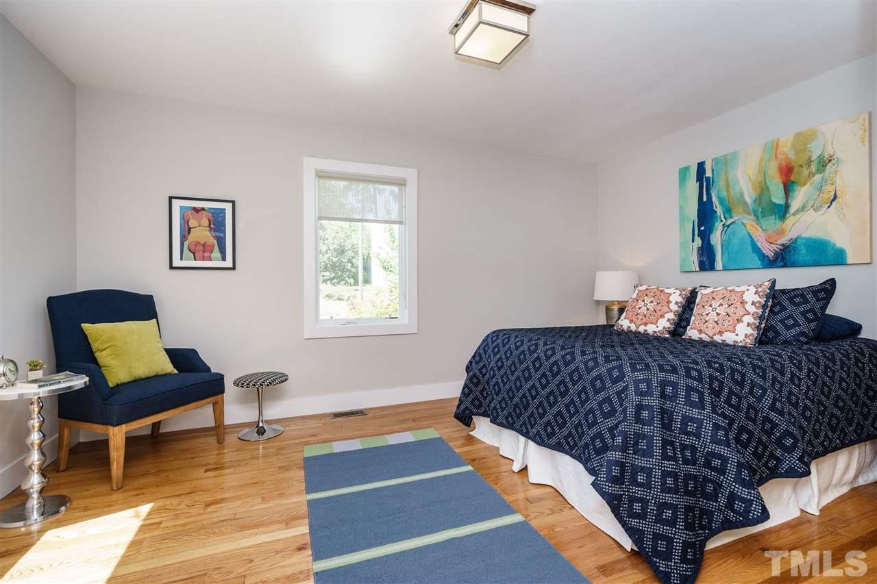 2514 Colton Place Raleigh, NC 27609 - Photo 15 of 25 a bedroom with furniture and a window