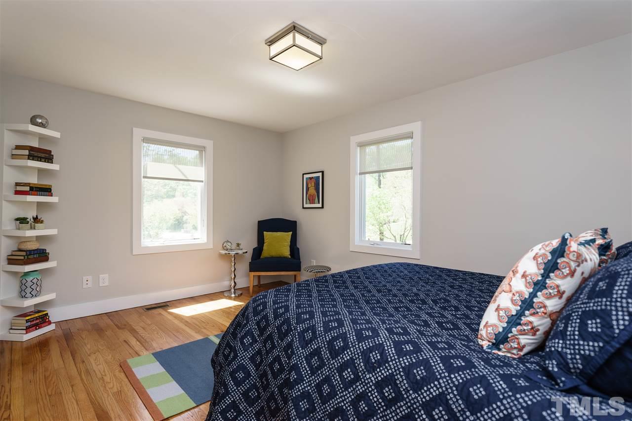 2514 Colton Place Raleigh, NC 27609 - Photo 16 of 25 a bedroom with a bed and a window