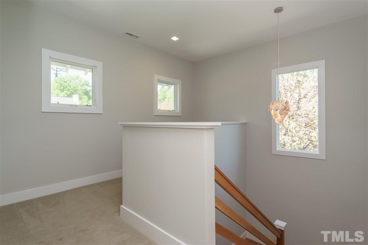 2514 Colton Place Raleigh, NC 27609 - Photo 21 of 25 a view of an empty room with a window