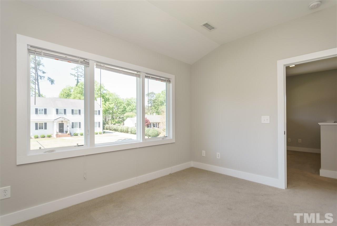 2514 Colton Place Raleigh, NC 27609 - Photo 24 of 25 an empty room with a window