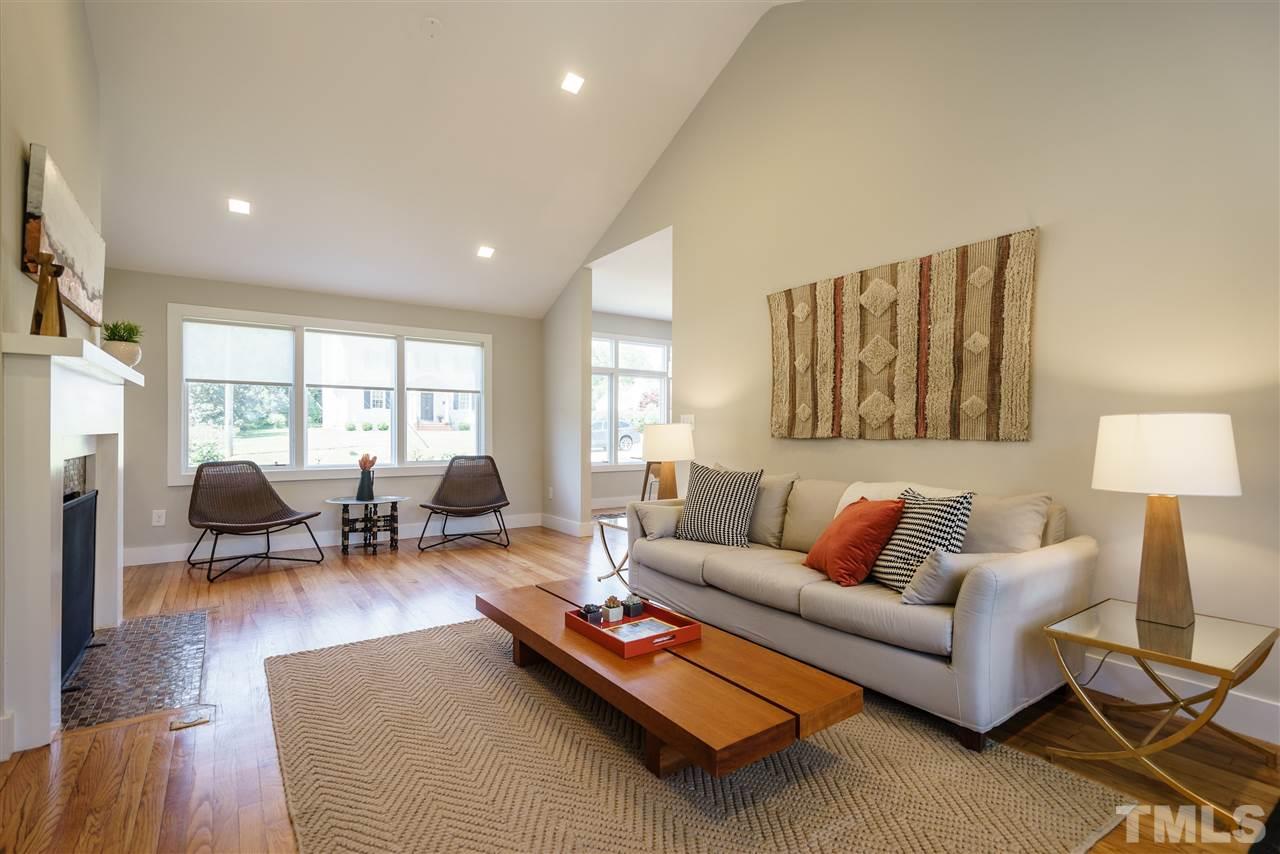 2514 Colton Place Raleigh, NC 27609 - Photo 4 of 25 a living room with furniture rug and window