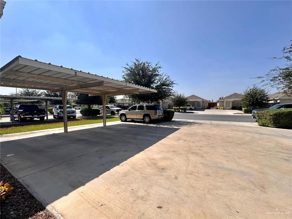 5700 Nightingale Avenue, Unit 1 Mission, TX 78573 - Photo 20 of 21 a view of outdoor space with swimming pool and furniture