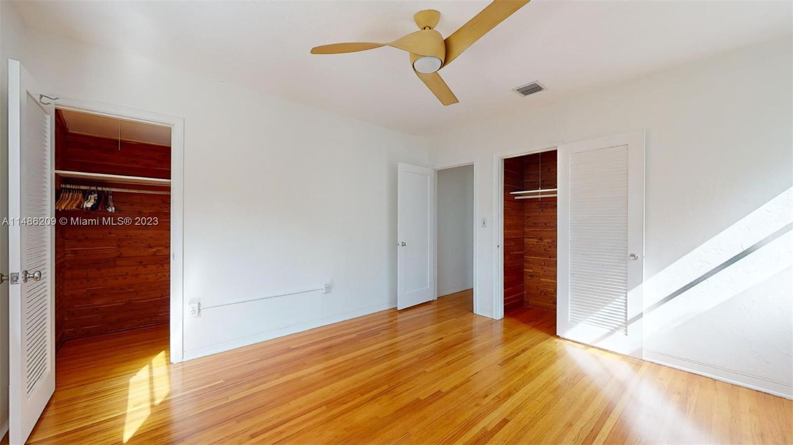 Normandy Beach Surfside, FL 33154 - Photo 14 of 22 a view of empty room with wooden floor