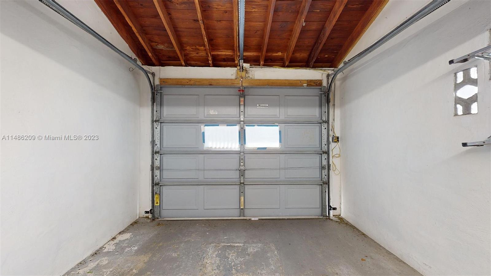 Normandy Beach Surfside, FL 33154 - Photo 16 of 22 a view of a room with racks on the wall