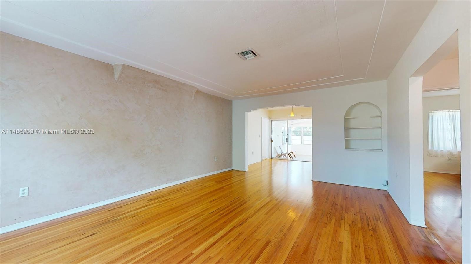 Normandy Beach Surfside, FL 33154 - Photo 5 of 22 a view of livingroom with wooden floor