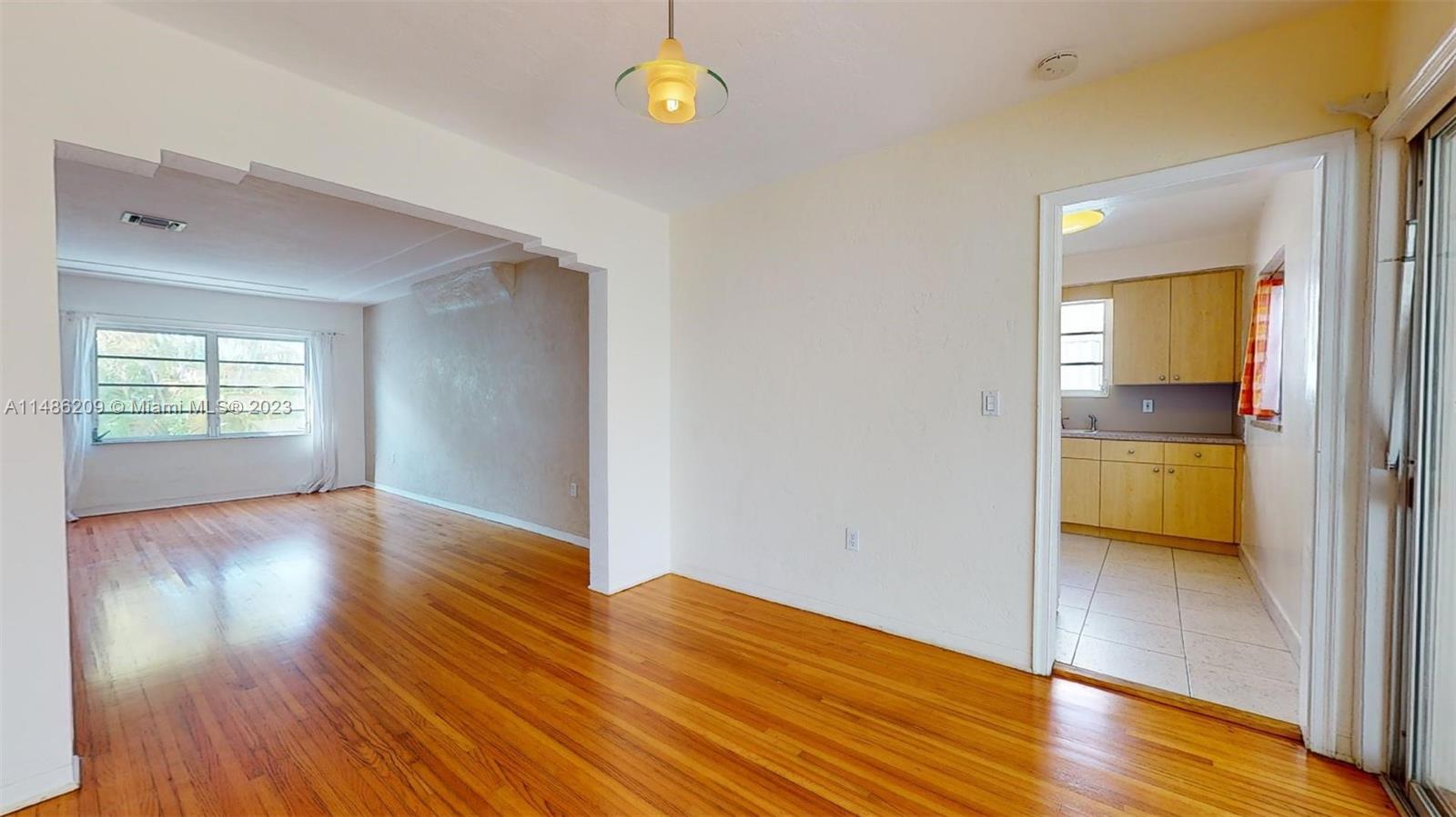 Normandy Beach Surfside, FL 33154 - Photo 7 of 22 a view of wooden floor and a sink in a room