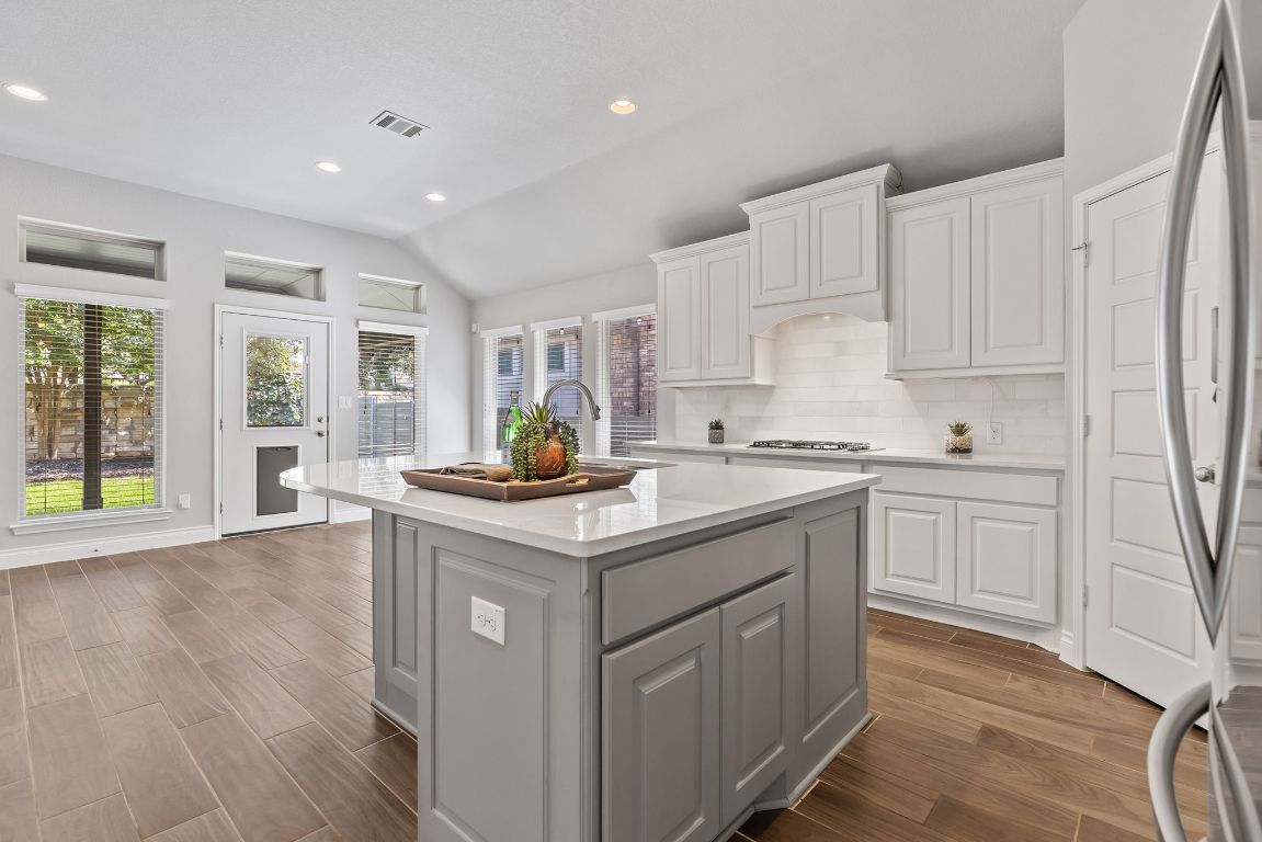 3604 Mercer Road Georgetown, TX 78628 - Photo 12 of 39 a kitchen with sink stove and cabinets