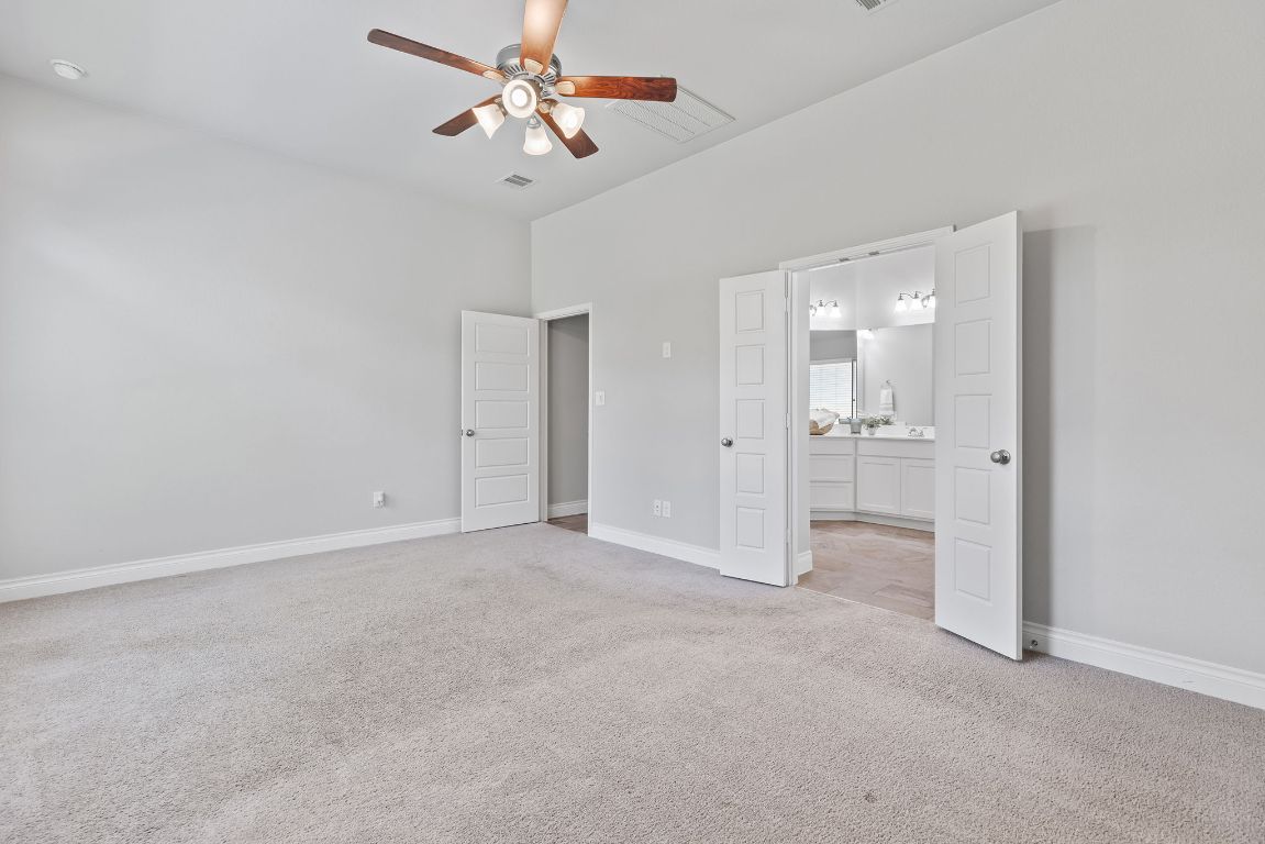 3604 Mercer Road Georgetown, TX 78628 - Photo 21 of 39 a view of empty room with a ceiling fan