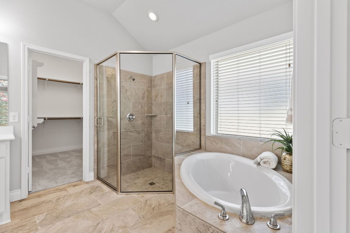 3604 Mercer Road Georgetown, TX 78628 - Photo 24 of 39 a bathroom with a bathtub and a shower