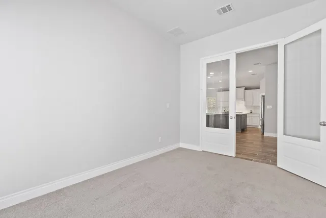 an empty room with windows