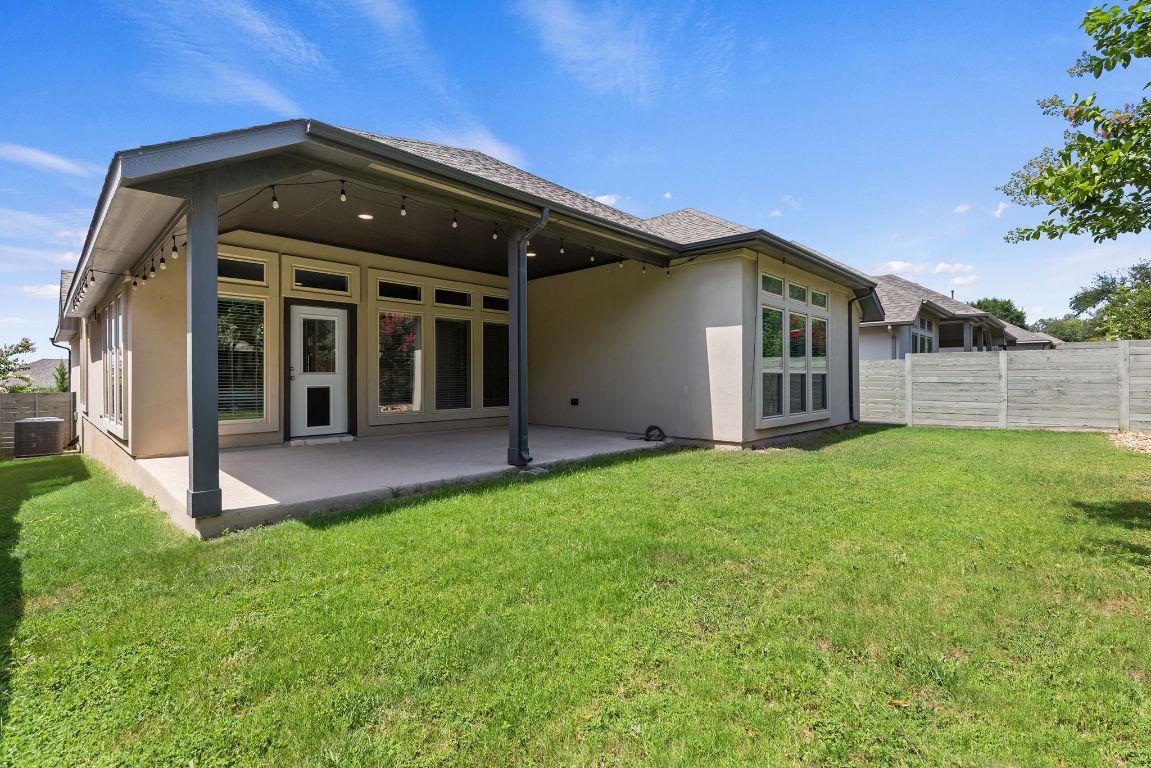 3604 Mercer Road Georgetown, TX 78628 - Photo 37 of 39 a front view of a house with a yard