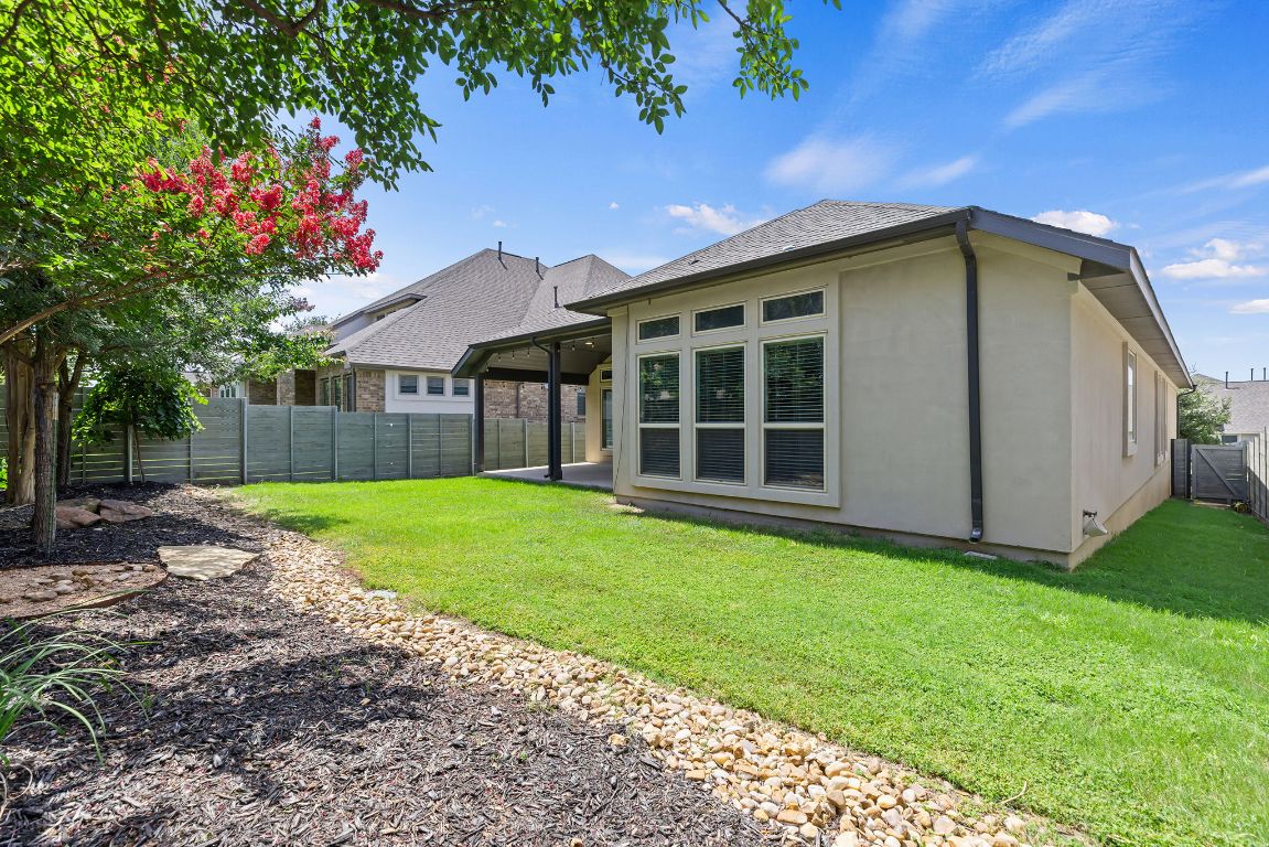 3604 Mercer Road Georgetown, TX 78628 - Photo 38 of 39 a view of a house with backyard and garden
