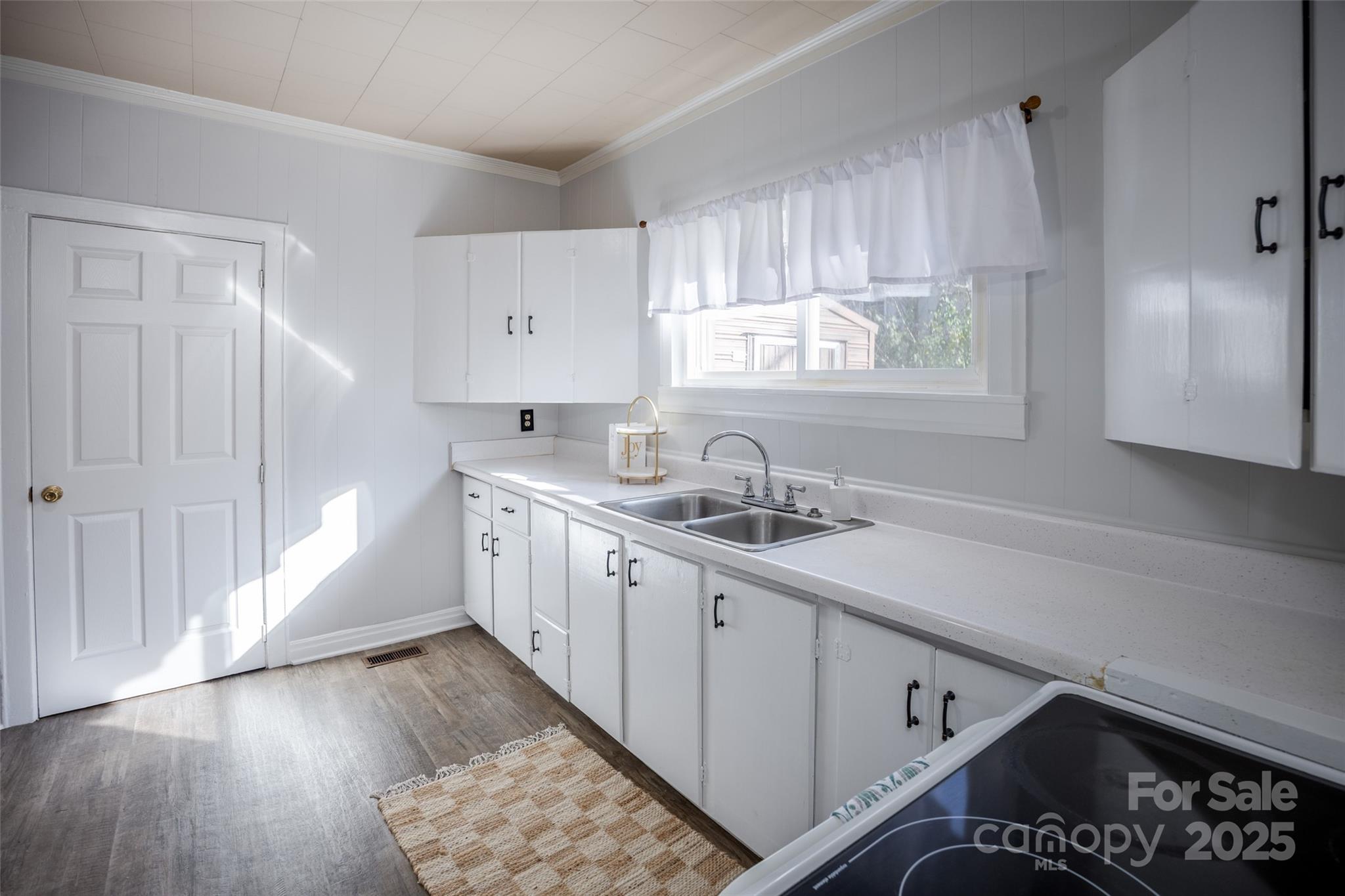 230 State Rd S-20-415 Winnsboro, SC 29180 - Photo 12 of 24 a kitchen with sink cabinets and window