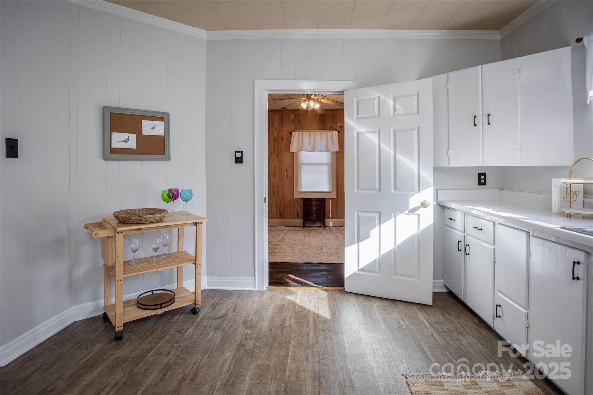 230 State Rd S-20-415 Winnsboro, SC 29180 - Photo 13 of 24 a view of kitchen with furniture and wooden floor