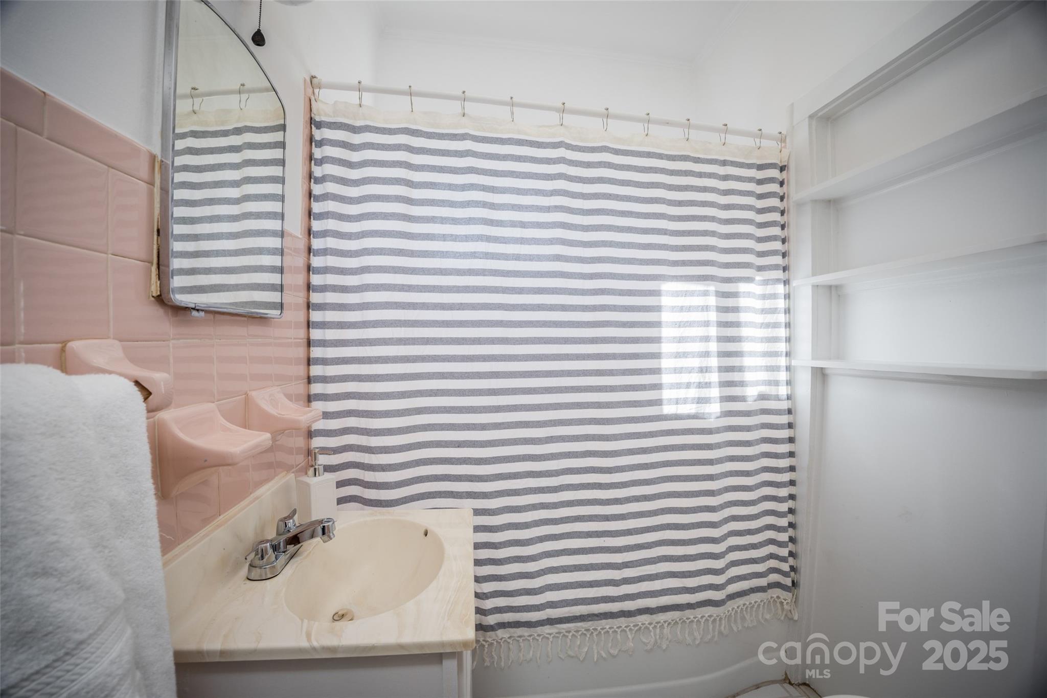 230 State Rd S-20-415 Winnsboro, SC 29180 - Photo 19 of 24 a bathroom with a sink and a mirror