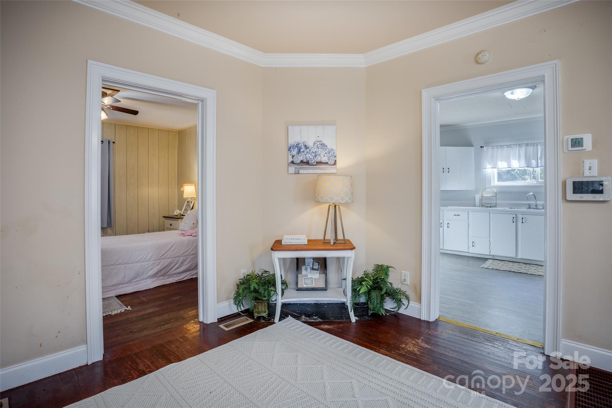 230 State Rd S-20-415 Winnsboro, SC 29180 - Photo 10 of 24 a view of a hallway with wooden floor and a bathroom