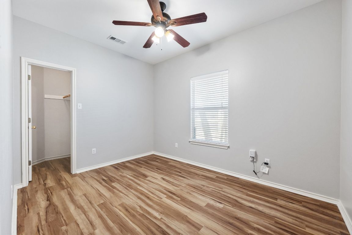 2906 Pearl Street, Unit C Austin, TX 78705 - Photo 17 of 28 a view of room window and a ceiling fan