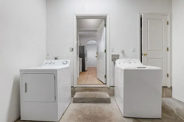 a utility room with a washer and dryer