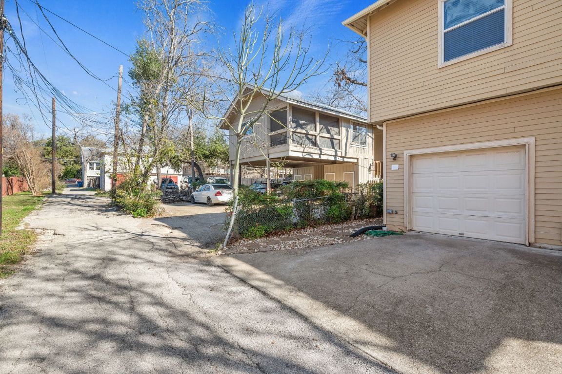 2906 Pearl Street, Unit C Austin, TX 78705 - Photo 26 of 28 a view of a street with houses