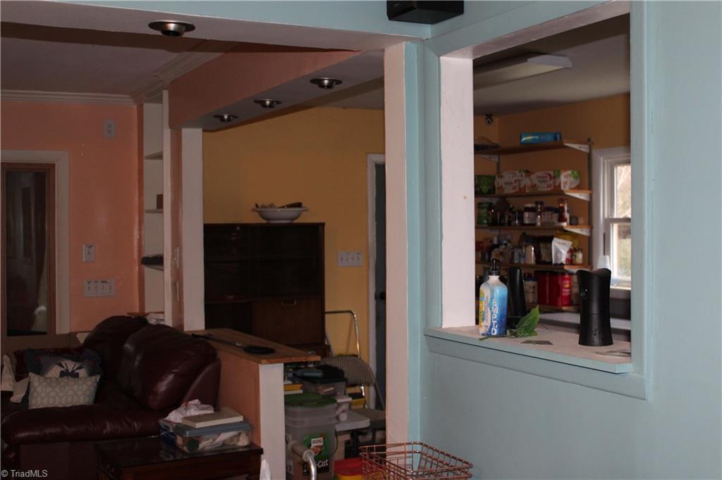 1409 Ritters Lake Road Greensboro, NC 27406 - Photo 11 of 14 View of dining room/kitchen area from living room.