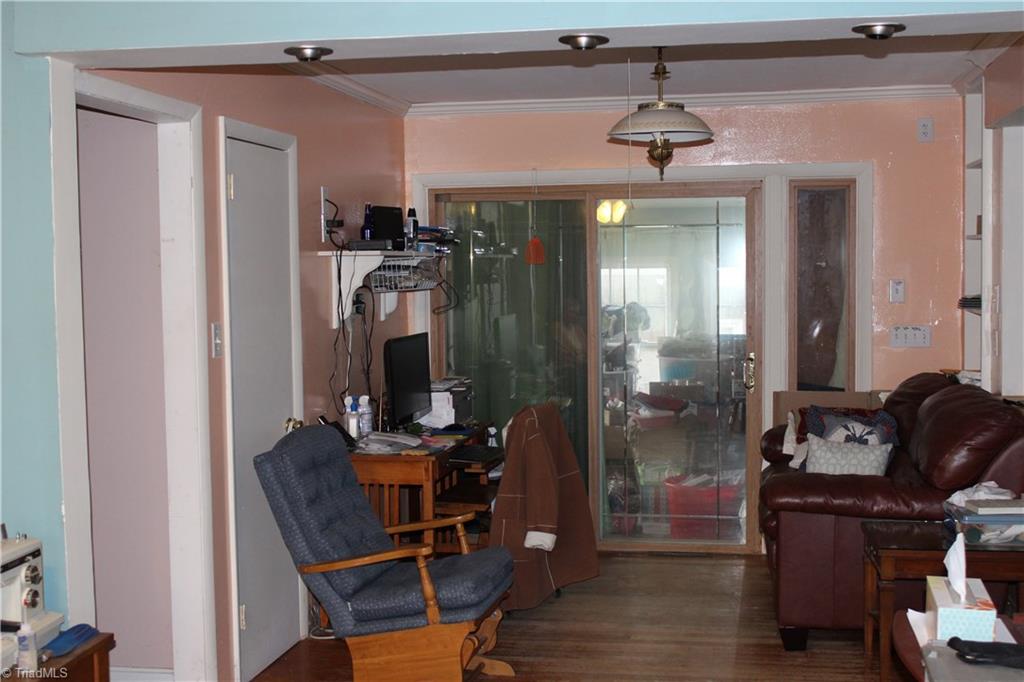 1409 Ritters Lake Road Greensboro, NC 27406 - Photo 7 of 14 Dining room looking out into sunroom.