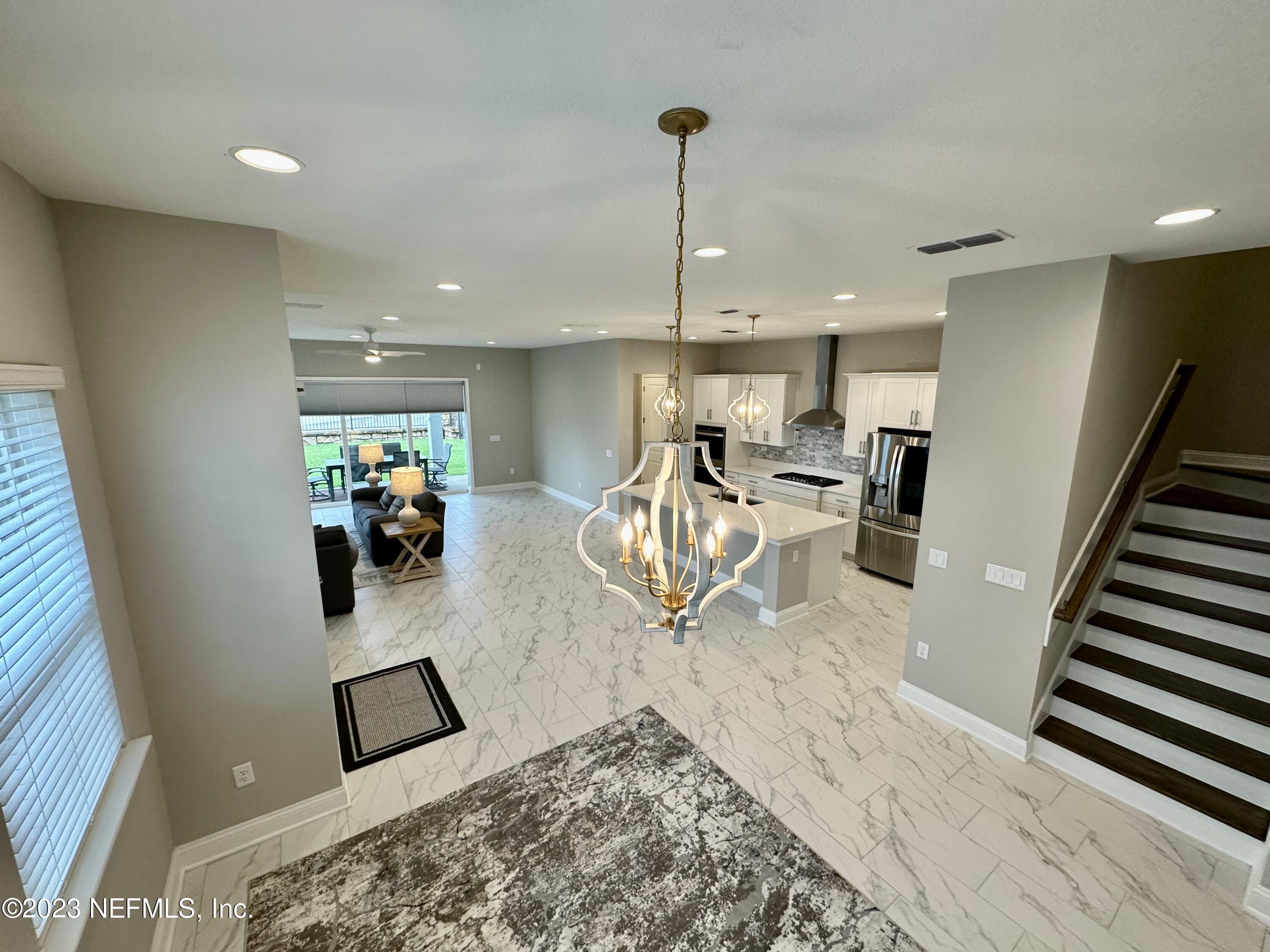 481 Marquesa Circle St. Johns, FL 32259 - Photo 17 of 53 a living room with furniture and wooden floor
