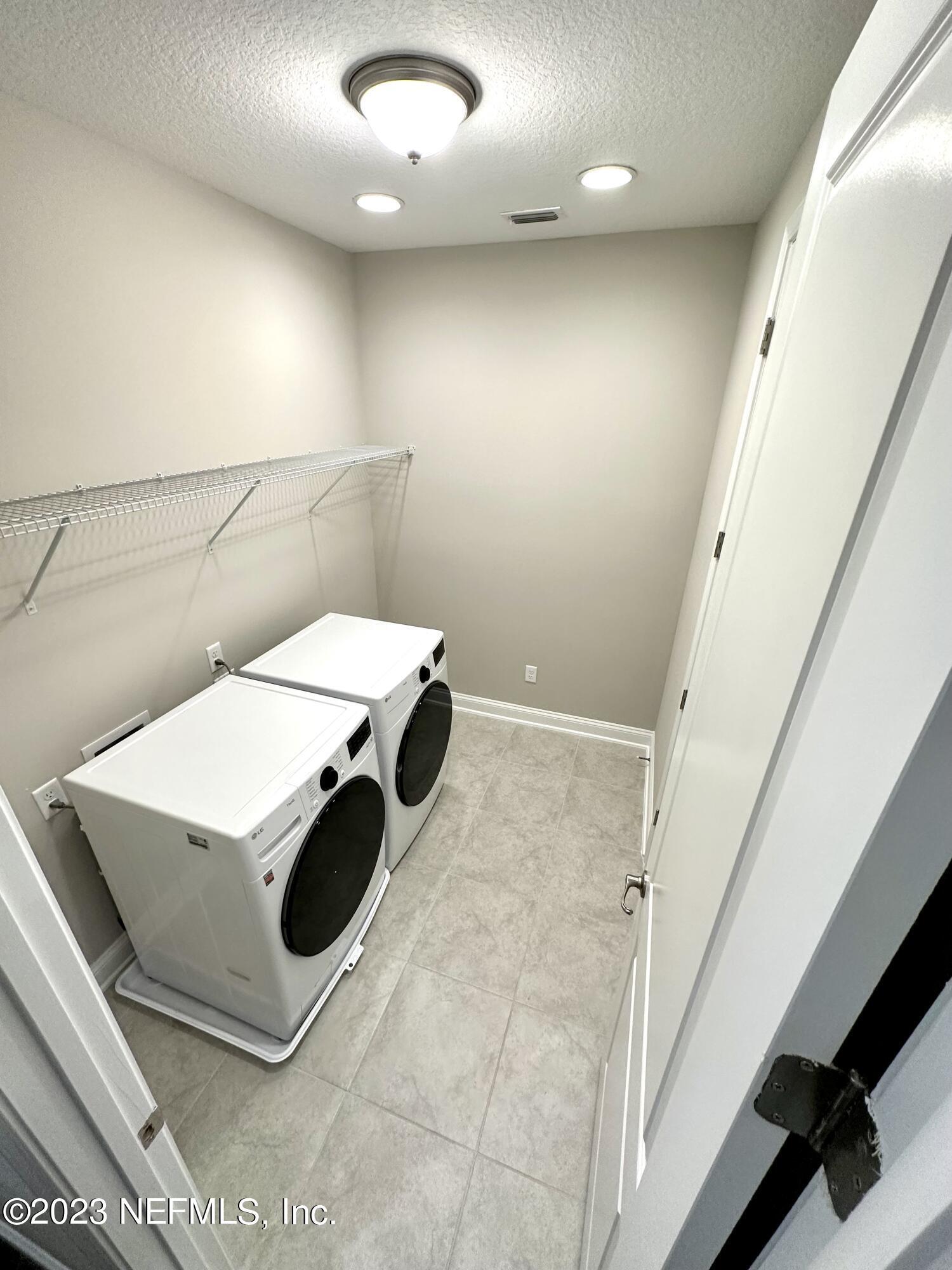 481 Marquesa Circle St. Johns, FL 32259 - Photo 40 of 53 a bathroom with a sink and mirror
