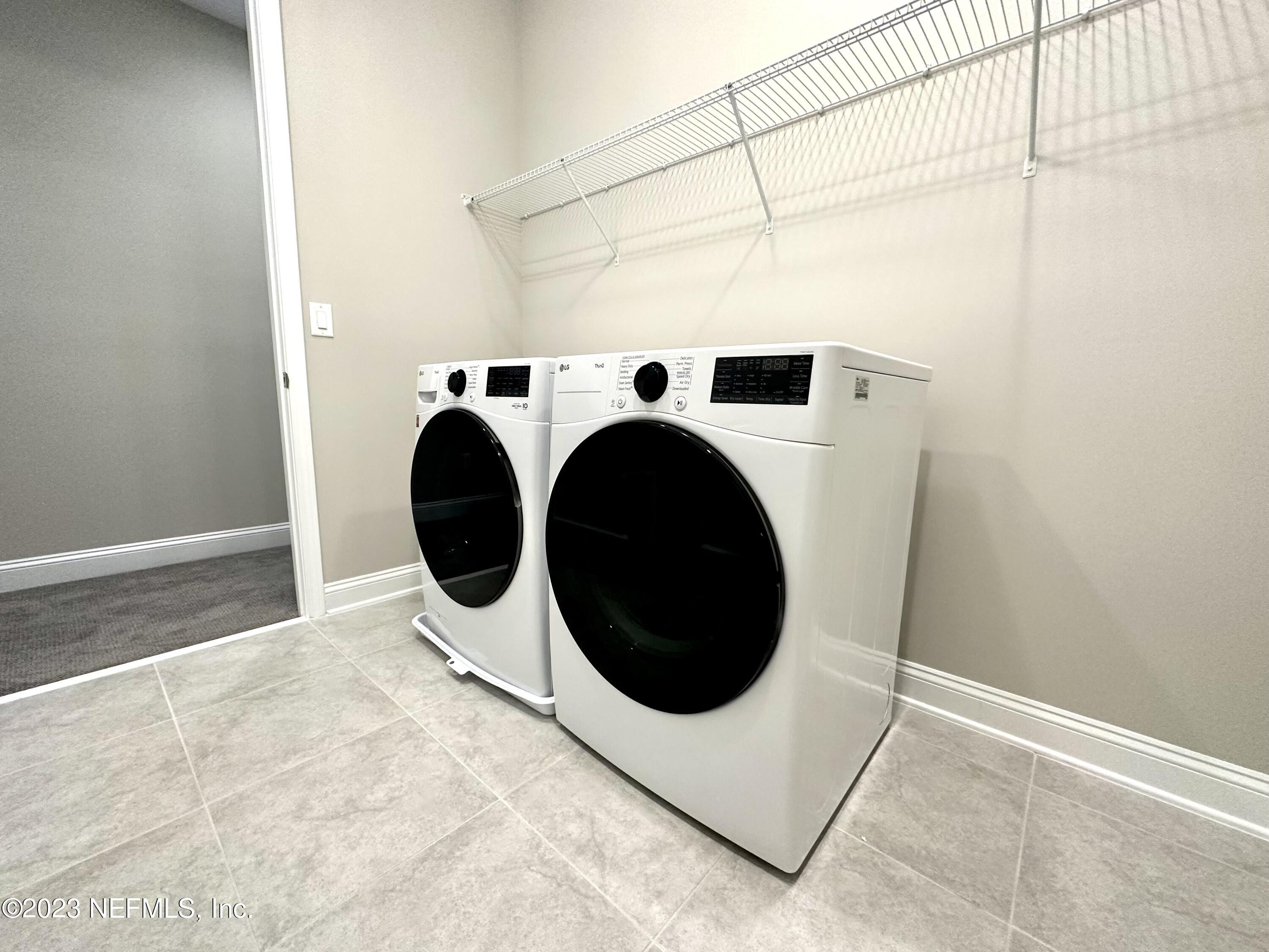 481 Marquesa Circle St. Johns, FL 32259 - Photo 41 of 53 a utility room with dryer and washer